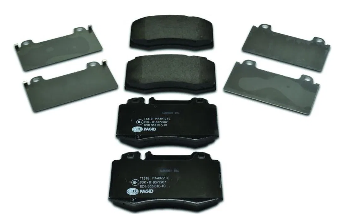 355010101 – HELLA Brake Pad, Low-Metallic Set Of 2 With Pad Wear Sensor